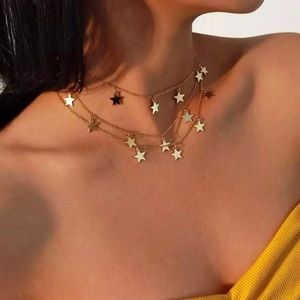 Seeing Stars Dangling Gold Tone Necklace 12-16"